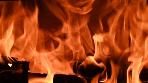 Fire in the fireplace as a close-up Stock Footage 233578545