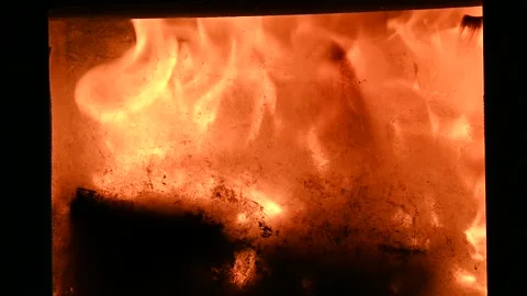 Fire in the fireplace as a close-up Stock Footage 233578675