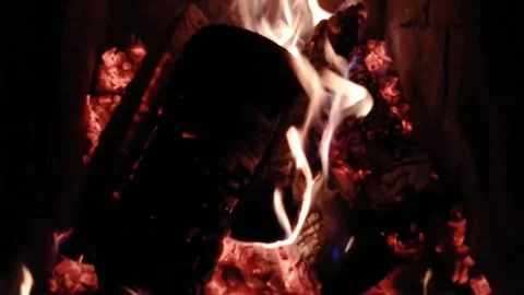Fire in the fireplace on a cold autumn evening Stock Footage 196149798