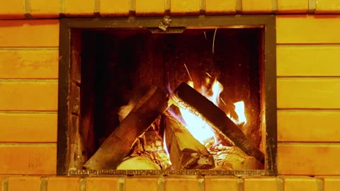 Fire in the fireplace on a cold night Stock Footage 169010155