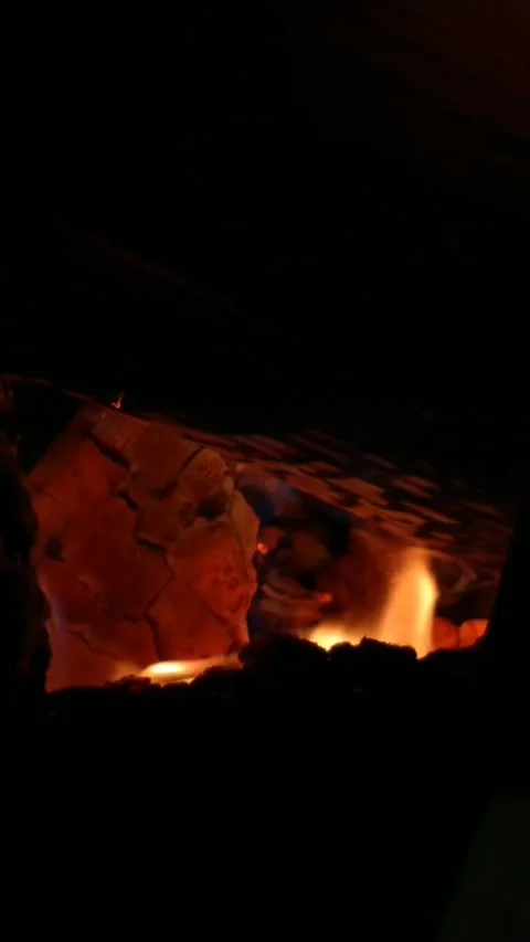 Fire in the fireplace with a cold night Stock Footage 201813520