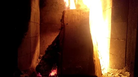 Fire in fireplace at cottage 4K Stock Footage 94453118