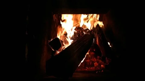 Fire in the fireplace in early October Stock Footage 212999413