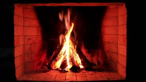 Fire in the fireplace in the evening Stock Footage 100587658