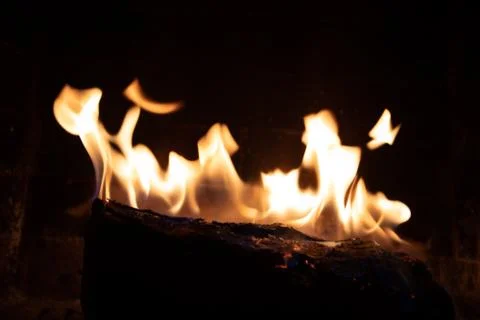 Fire in fireplace figures Foto stock