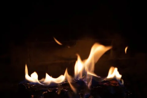 Fire in fireplace figures Stock Photos