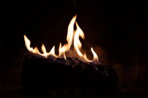 Fire in fireplace figures Stock Photos
