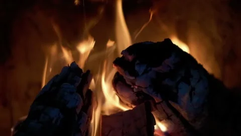 Fire in fireplace at home time introspection flames slow motion Stock Footage 228297074