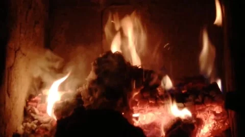 Fire in the fireplace at home in winter Stock Footage 174685172