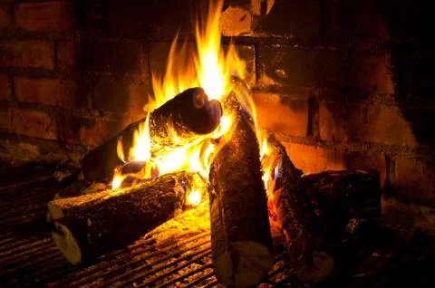 Fire in fireplace Stock Photos