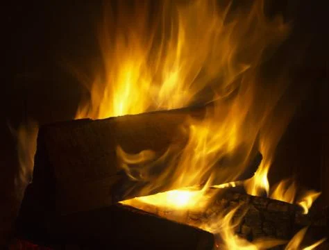Fire in fireplace Stock Photos