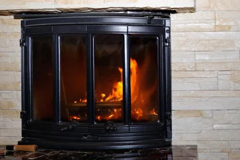 Fire in the fireplace. Stock Photos