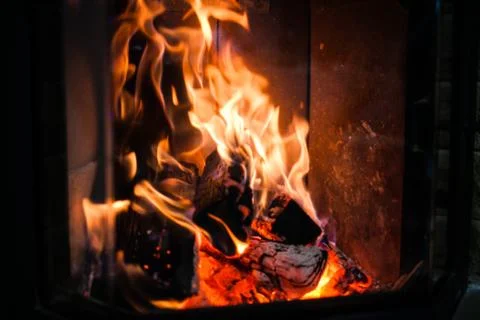 Fire in the fireplace. Stock Photos