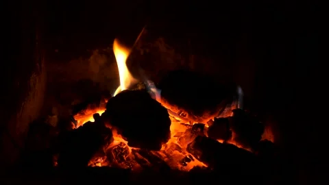 Fire in the fireplace red coals Video stock 144647086