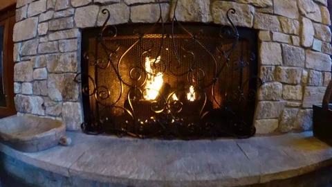 A fire in a fireplace at a ski resort. Stock Footage