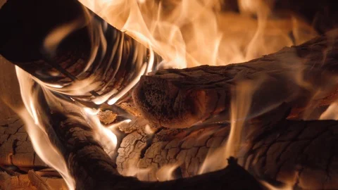 Fire from firewood in a fireplace close-up Stock Footage 114086712