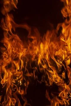 Fire flame background. Hell bonfire. Texture of fire on a black background. A 스톡 사진