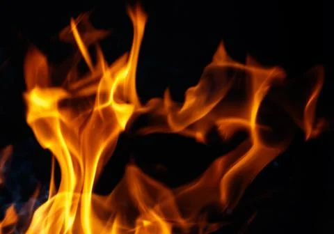 Fire flame on black background Stock Photos