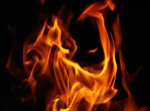 Fire flame on black background Stock Photos