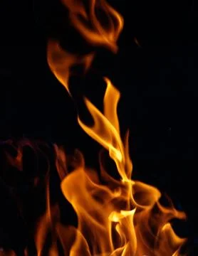 Fire flame on black background Stock Photos