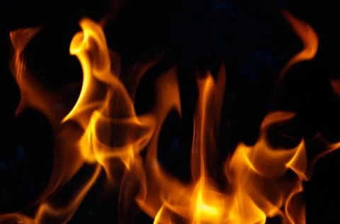 Fire flame on black background Stock Photos