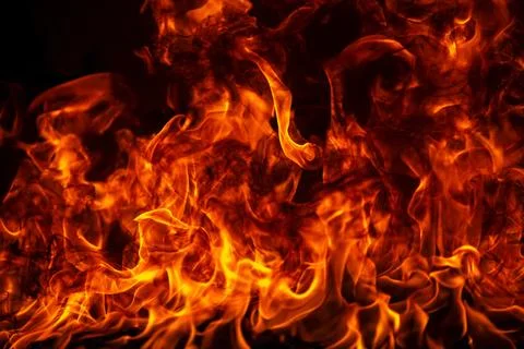 Fire flame burning and fire glowing on black background. Stock Photos