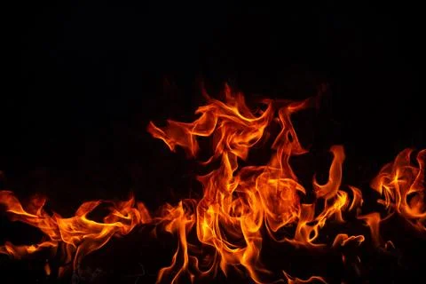 Fire flame burning and fire glowing on black background. Stock Photos