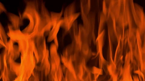 Fire flame burning and glowing on dark black background Stock Footage 246932831