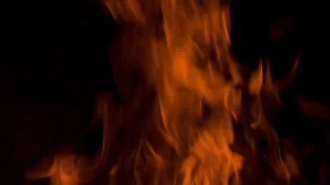 Fire flame burning and glowing on dark black background Stock Footage 246937188