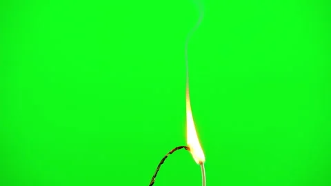 Fire flame burning electric line cable on green screen background Video stock 242204015