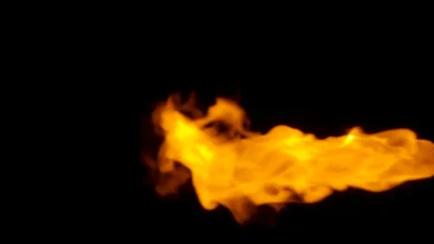 Fire flame bursting in one direction, isolated on black Stock Footage 82634182