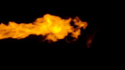 Fire flame bursting in one direction, isolated on black Stock Footage 82634407