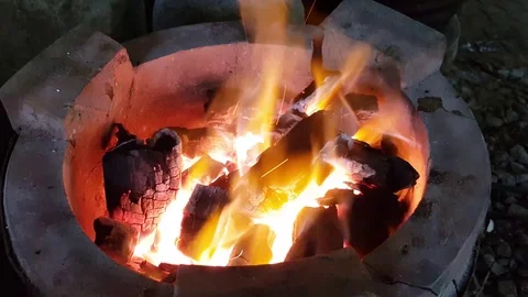 Fire flame in ceramic pot -brasero thailand traditional 4K Stock Footage 98241934