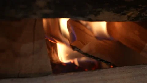 Fire flame. Close up of some very hot charcoal burning in a grill in slow motion Stock Footage 163596617