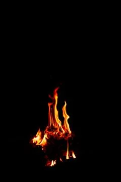 Fire Flame in dark background. Stock Photos