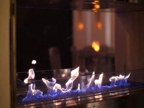Fire flame Flames in a Modern Fireplace roaring gas burning outdoors at night 動画素材 83863371