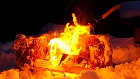 Fire flame flames in a modern fireplace roaring gas burning outdoors at night Stock Footage 105105362