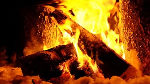 Fire flame flames in a modern fireplace roaring gas burning outdoors at night Stock Footage 105105390