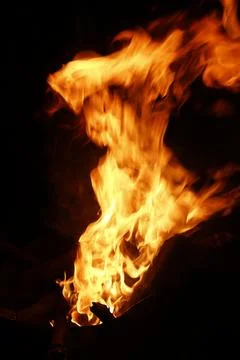 Fire flame isolated on black background Stock Photos