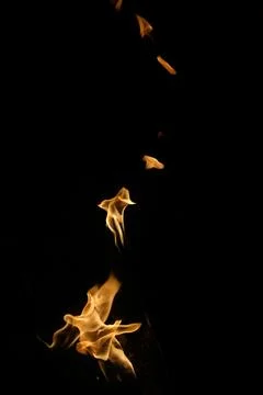Fire flame isolated on black background Stock Photos