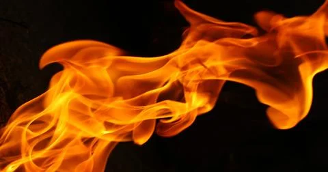Fire flame isolated on black background Stock Photos