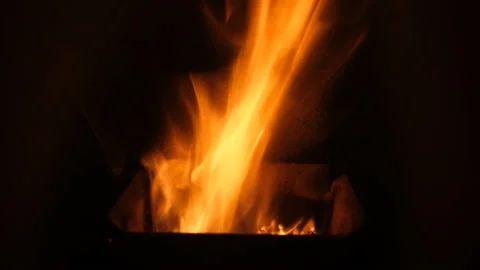 Fire flame motion burning on a pellets stove in winter time,home heat equipment Stock Footage 167184575