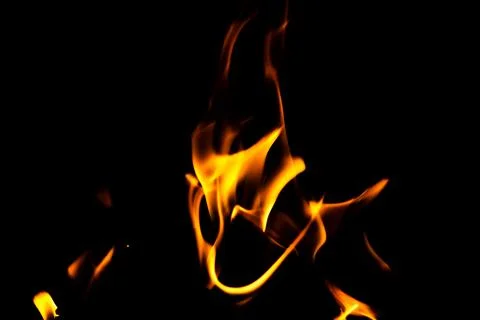 Fire flame texture. Burning material backdrop. Burn effect pattern. Blaze a.. Stock Photos