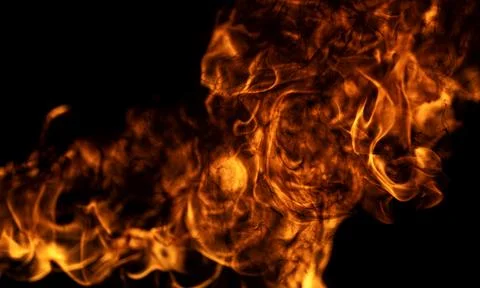 Fire flame textured background. Burning fire. Fire flames on black background Stock Photos