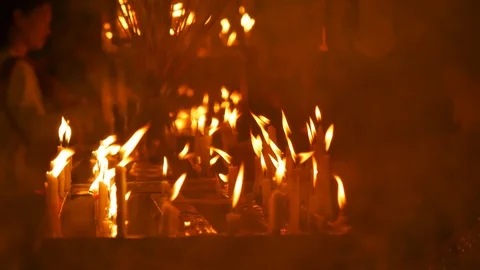 Fire flame traditional candles in place of worship praying in spirituality buddh Stockbeeldmateriaal 124341993