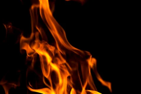Fire flames abstract on black background. Fire and burning flame on dark back Stock Photos