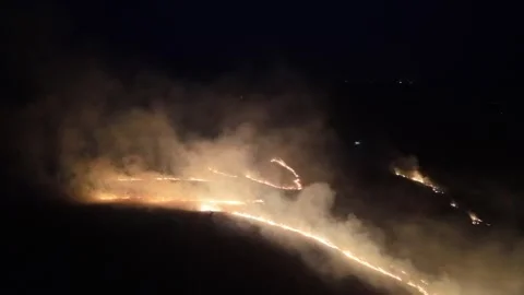 Fire flames and smoke burn with brush fire in appalachian mountains Stock Footage 332227593