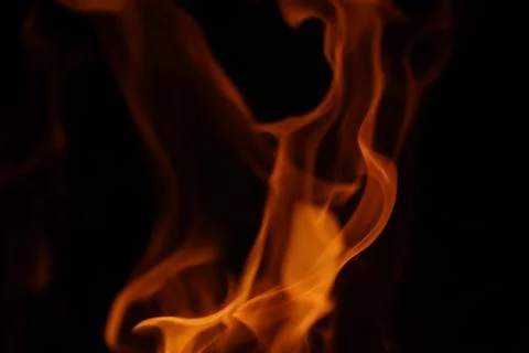 Fire flames background. Heat energy heap closely, red and yellow, thermal e.. Stock Photos