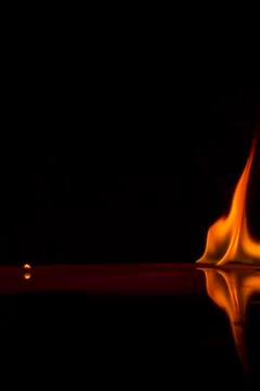 Fire flames on a  background Stock Photos