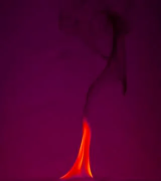 Fire flames on a  background Stock Photos